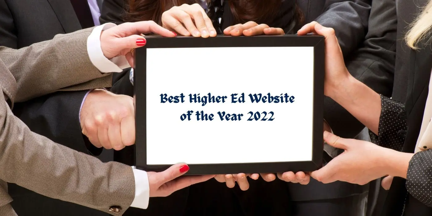 Several professionals holding a frame that reads 'best higher ed website of the year 2022'