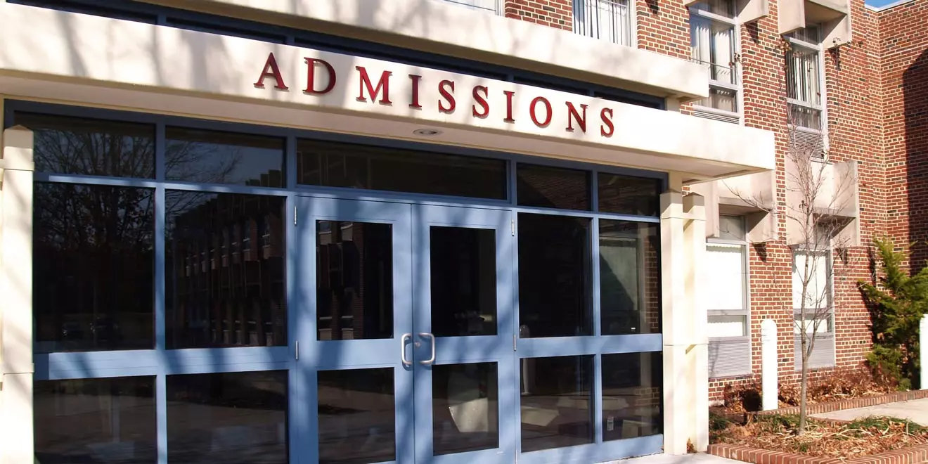 An outside shot of a school's admissions building