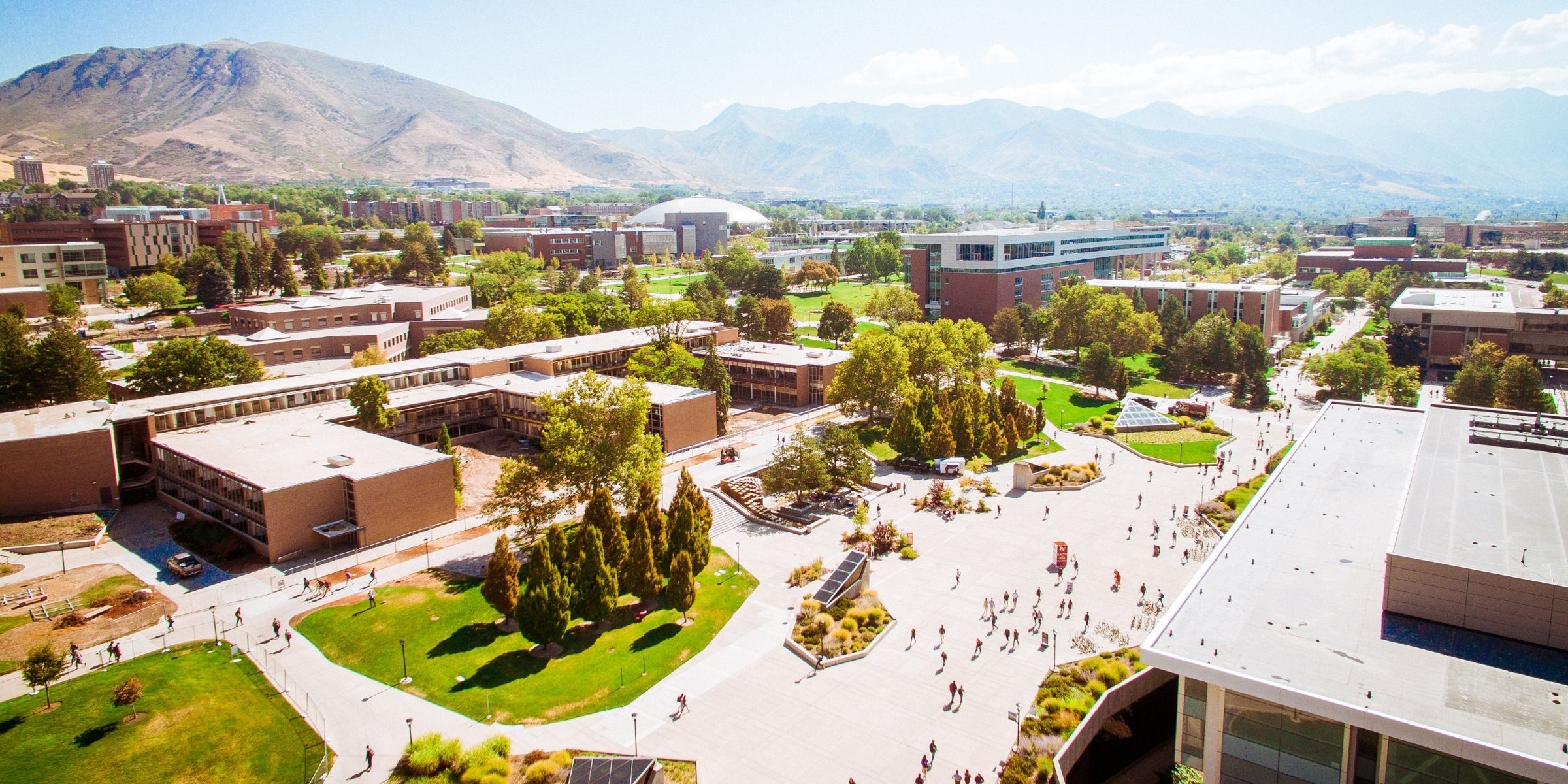 a rural campus surrounded by mountains 